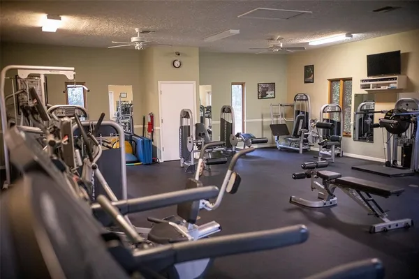 a view of a room with gym equipment
