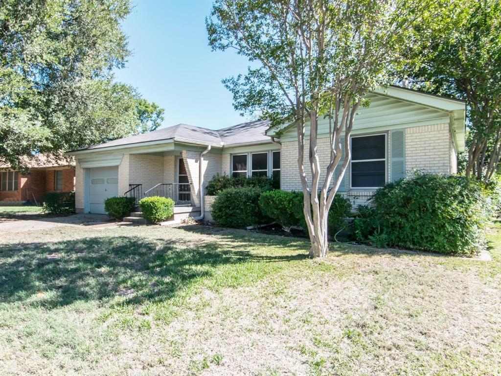 9302 Piper Lane Dallas, TX 75228 - Photo 13 of 13 a front view of house with yard and trees