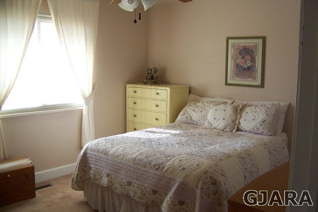 3417 D Road Palisade, CO 81526 - Photo 15 of 16 a bedroom with a bed and a window