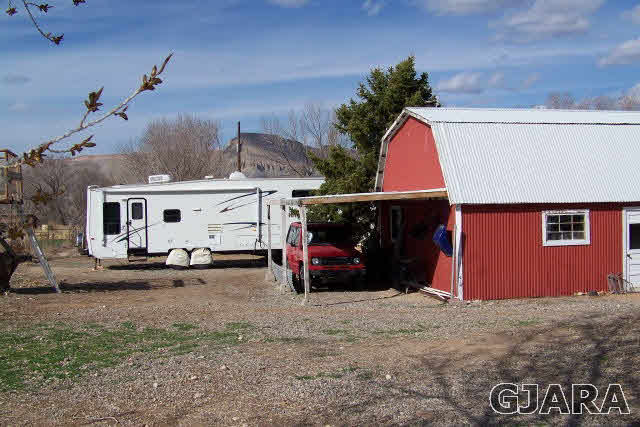3417 D Road Palisade, CO 81526 - Photo 6 of 16 a view of a car park in front of house