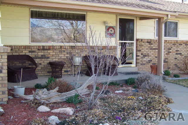 3417 D Road Palisade, CO 81526 - Photo 7 of 16 a view of a porch with seating space
