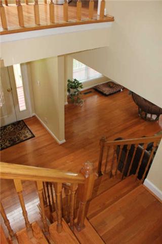 1500 CC Road Kingston Springs, TN 37082 - Photo 3 of 19 Welcome guests in your front door to your beautiful hardwood foyer and door with side lights. Beautiful oak steps going upstairs and living room to the side. Wonderful inviting entrance.