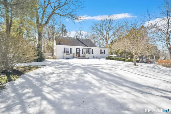 a view of city with tall house