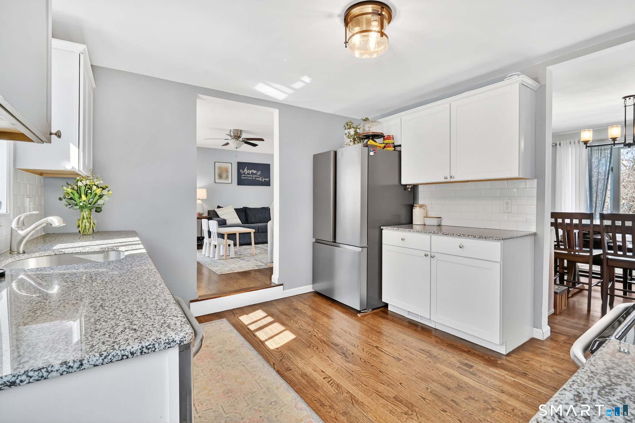 256 Albrecht Road Torrington, CT 06790 - Photo 11 of 31 a kitchen with stainless steel appliances granite countertop a refrigerator a stove and a sink with granite countertops