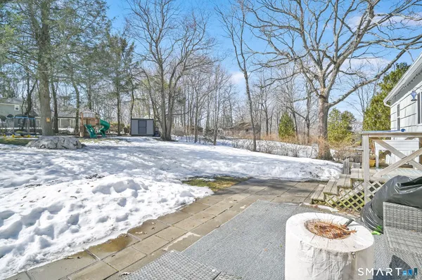 a backyard of a house with trees
