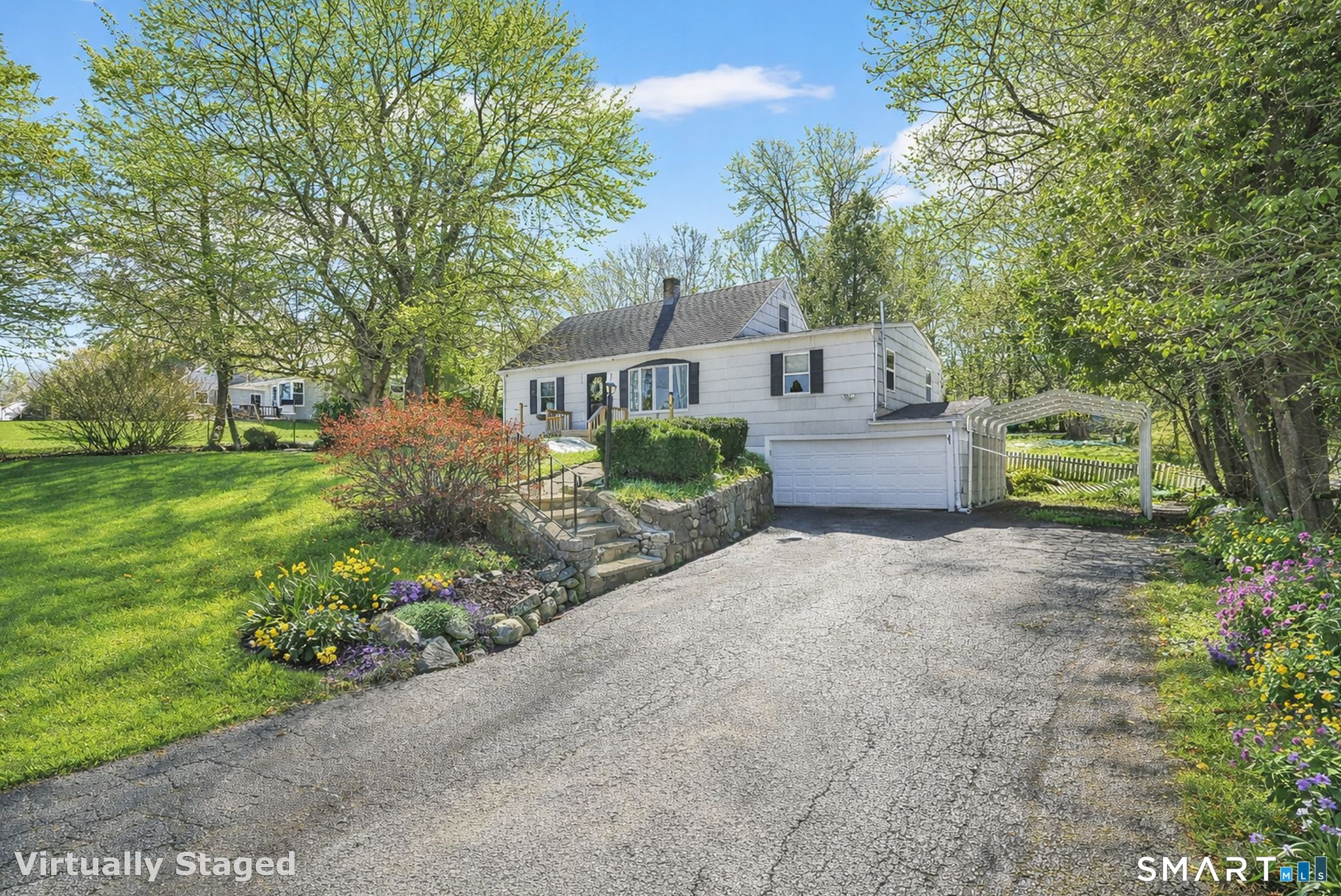 256 Albrecht Road Torrington, CT 06790 - Photo 3 of 31 a front view of a house with a garden and trees