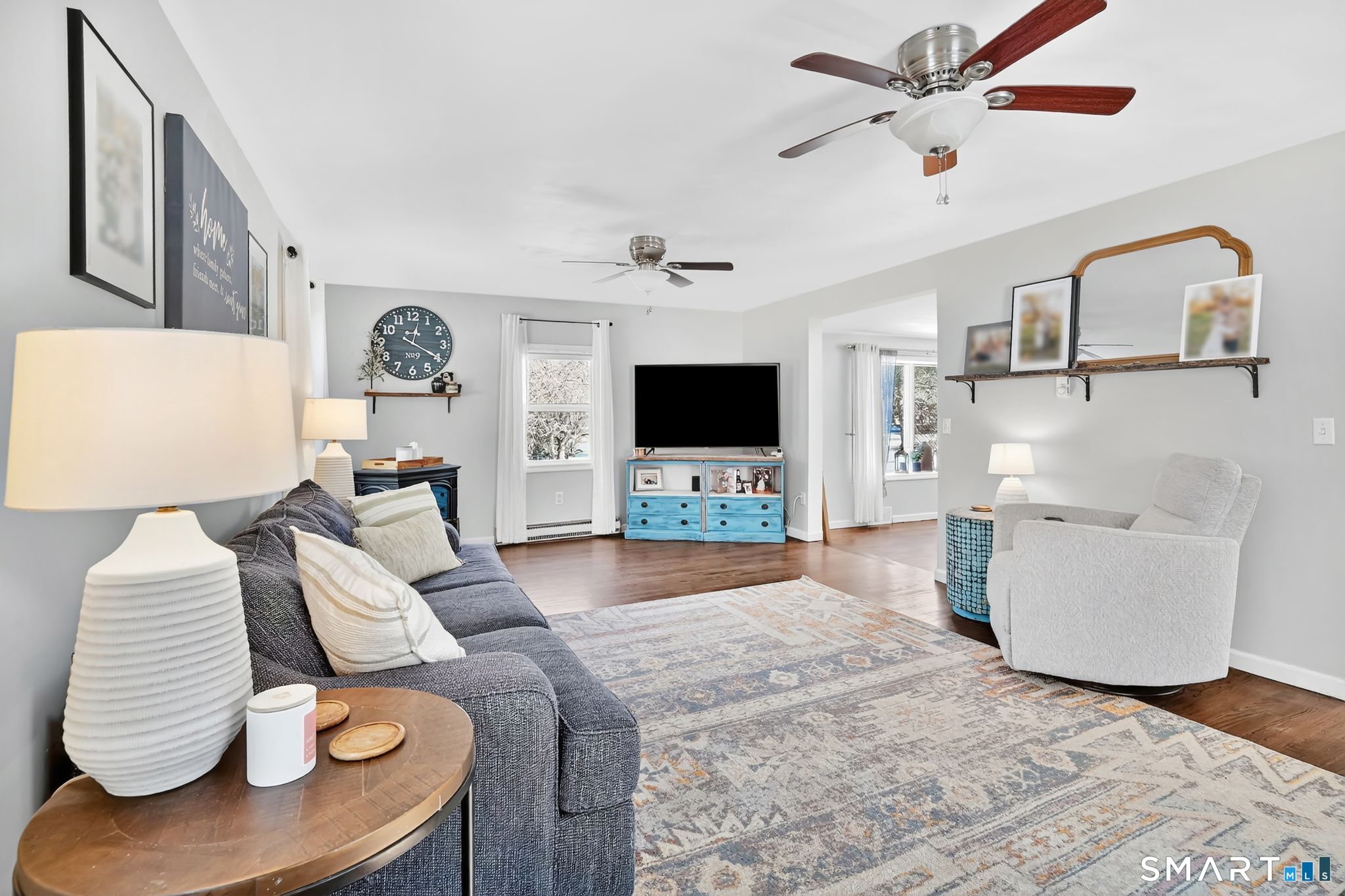 256 Albrecht Road Torrington, CT 06790 - Photo 9 of 31 a living room with furniture and a flat screen tv