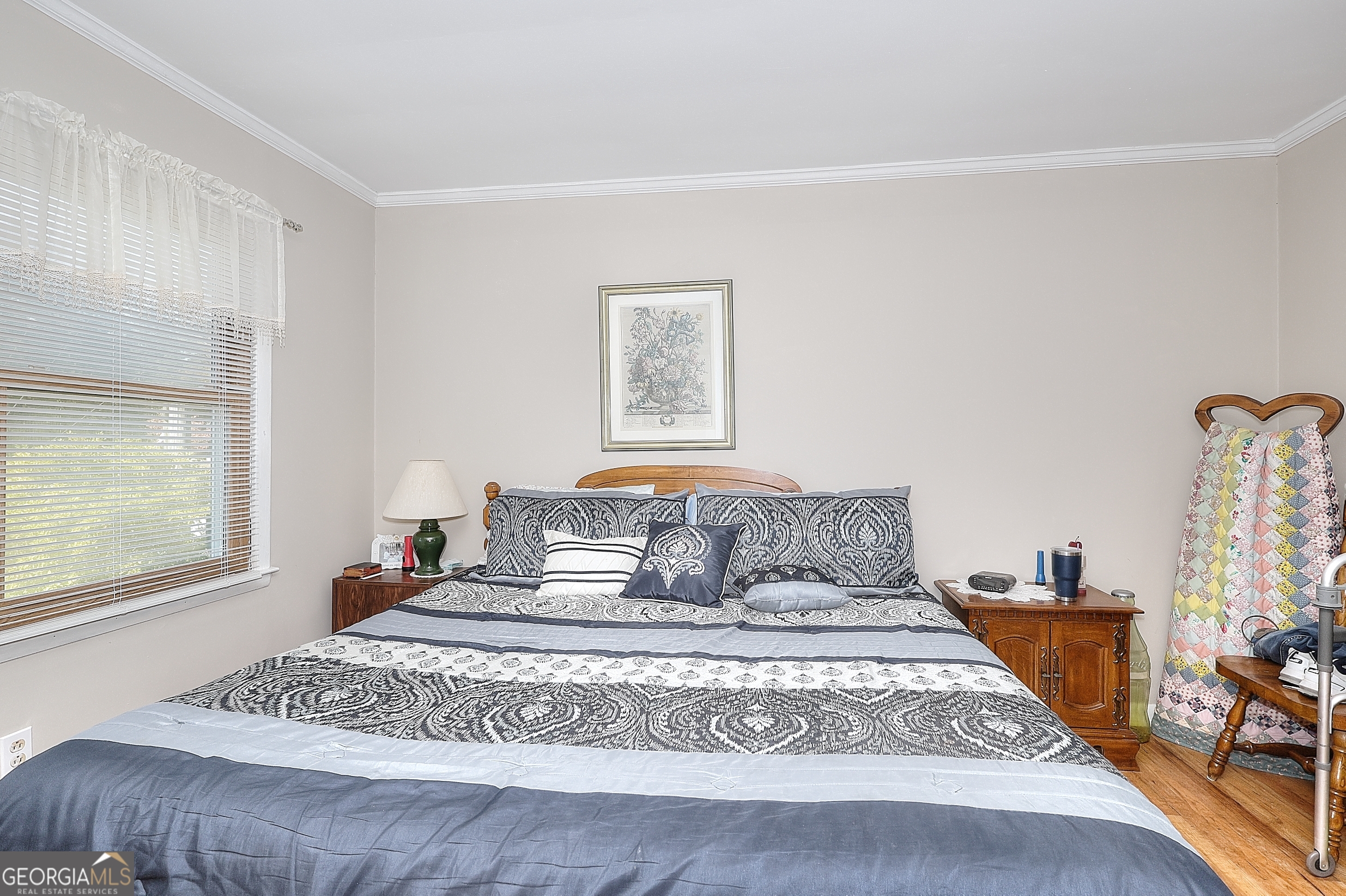 2850 Liberty Church Road White Plains, GA 30678 - Photo 12 of 33 a bedroom with a bed and a window