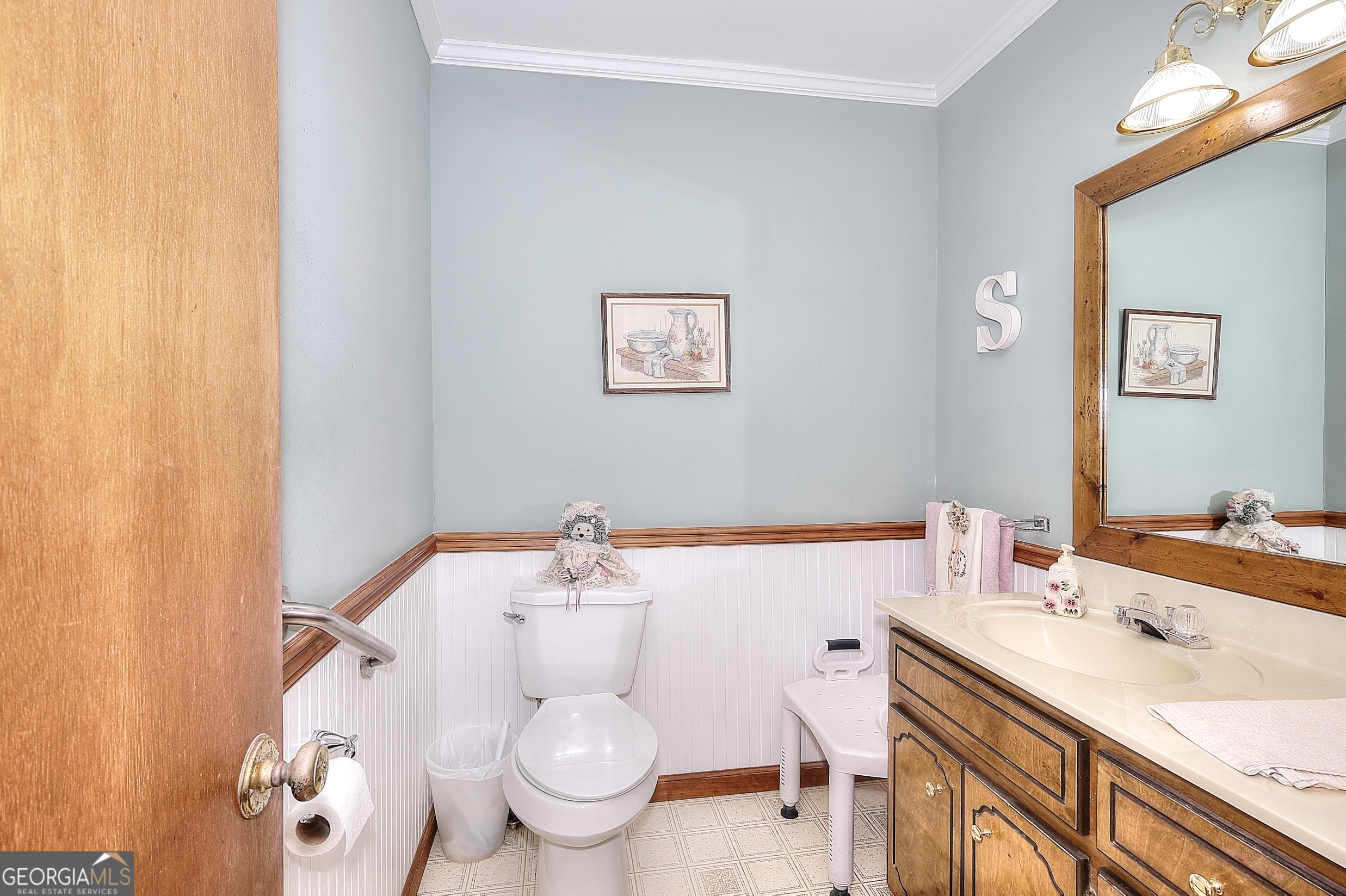 2850 Liberty Church Road White Plains, GA 30678 - Photo 16 of 33 a bathroom with a sink toilet and a mirror