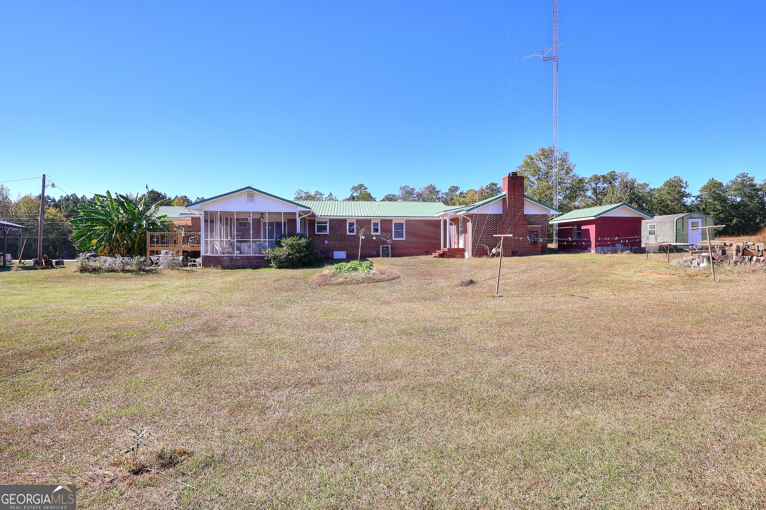 2850 Liberty Church Road White Plains, GA 30678 - Photo 25 of 33 a view of a house with a yard and sitting area