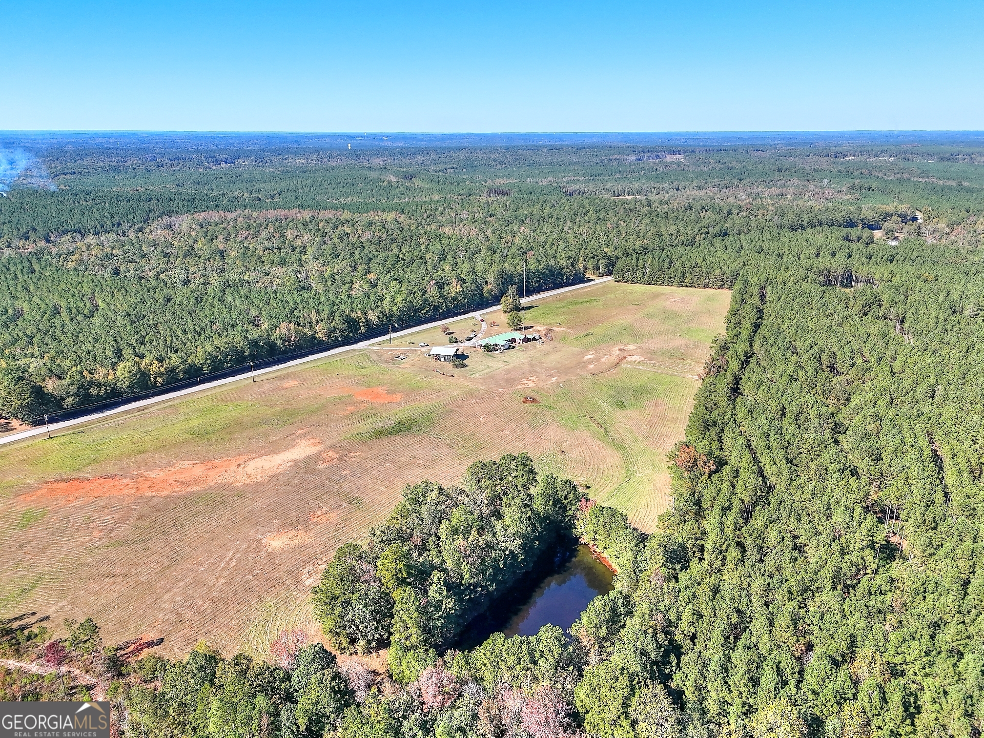 2850 Liberty Church Road White Plains, GA 30678 - Photo 31 of 33 a view of a lake with a yard