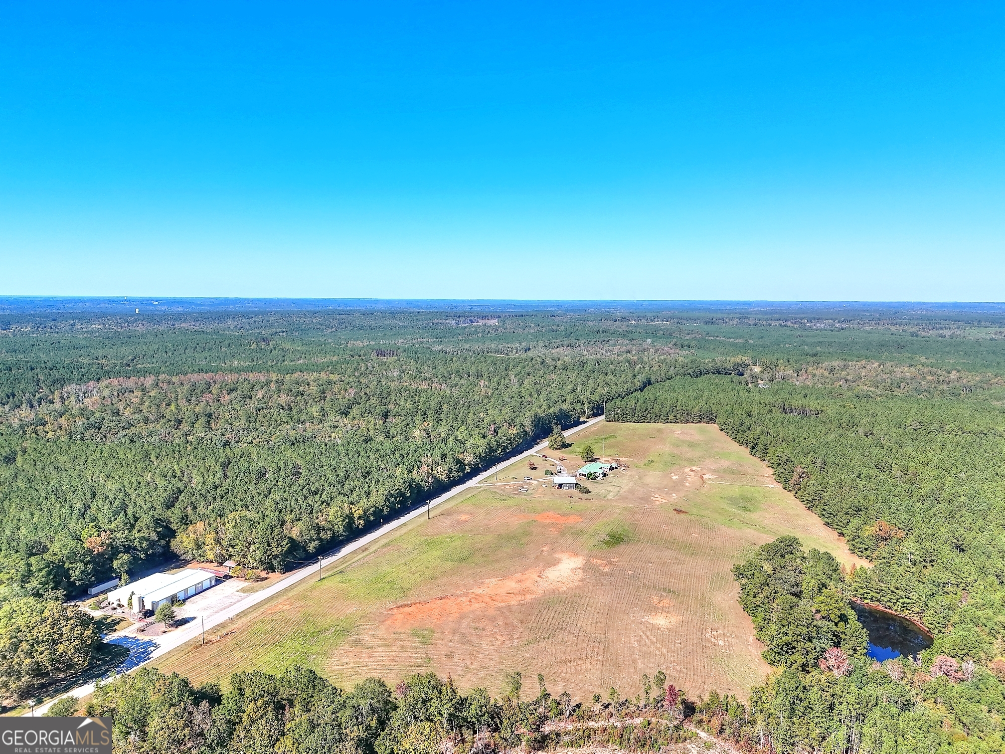 2850 Liberty Church Road White Plains, GA 30678 - Photo 32 of 33 a view of a lake and mountain