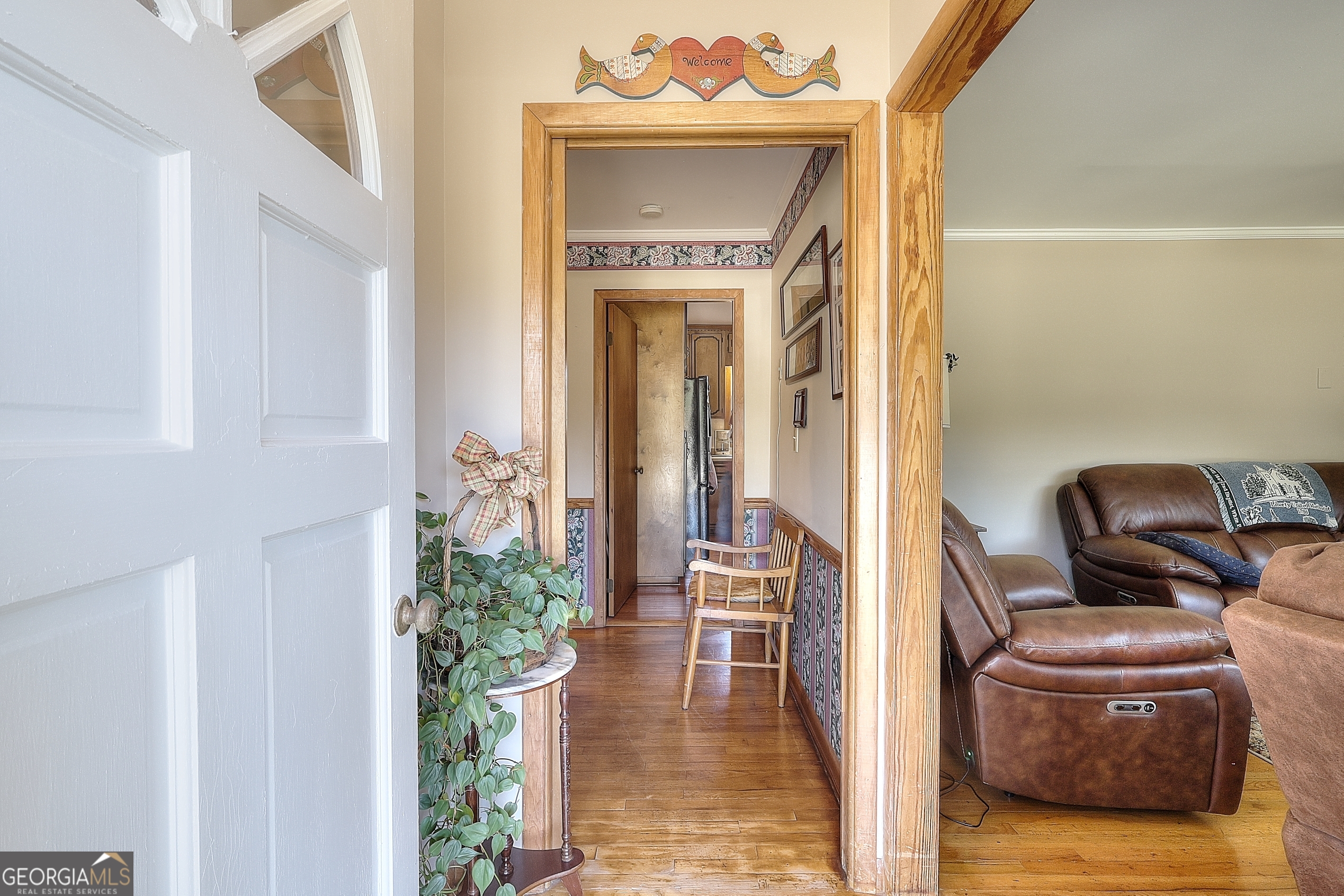2850 Liberty Church Road White Plains, GA 30678 - Photo 4 of 33 a living room with furniture and a gate