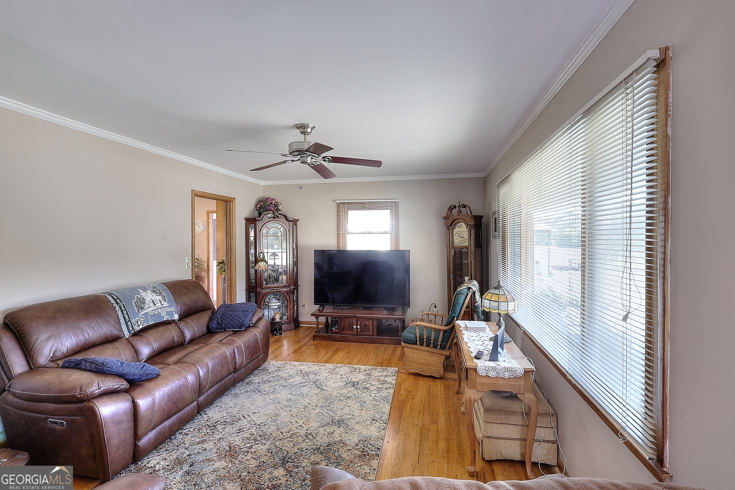 2850 Liberty Church Road White Plains, GA 30678 - Photo 5 of 33 a living room with furniture and a flat screen tv