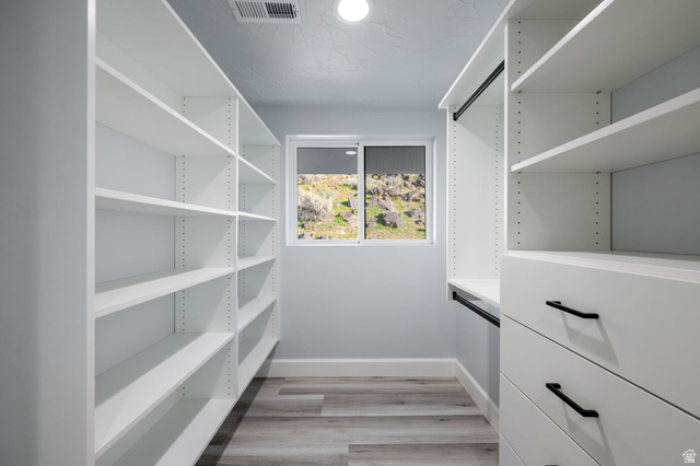476 Spring Drive Toquerville, UT 84774 - Photo 55 of 95 Walk in closet with light wood finished floors