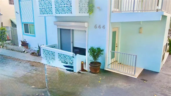 a view of a porch with a bench