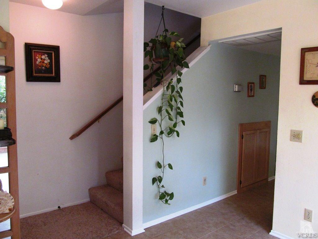 4508 Apricot Road, Unit A Simi Valley, CA 93063 - Photo 11 of 27 an entryway with wooden floor and front door