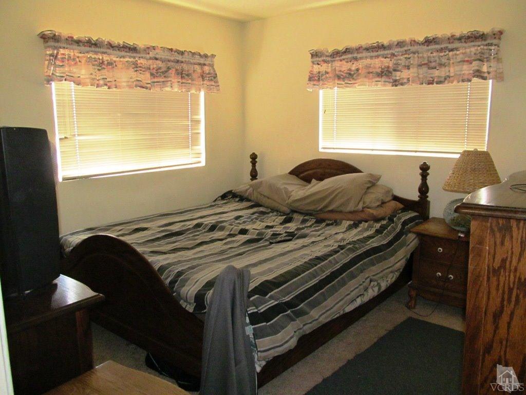 4508 Apricot Road, Unit A Simi Valley, CA 93063 - Photo 17 of 27 a bedroom with a bed and a window