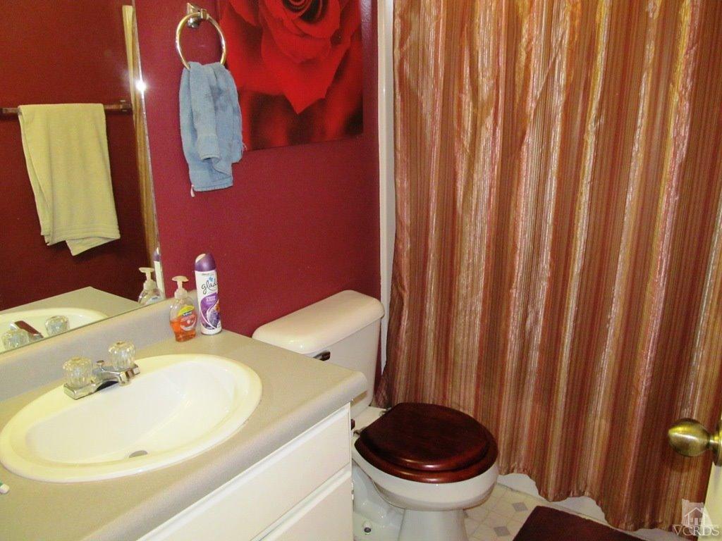 4508 Apricot Road, Unit A Simi Valley, CA 93063 - Photo 18 of 27 a bathroom with a sink and a toilet