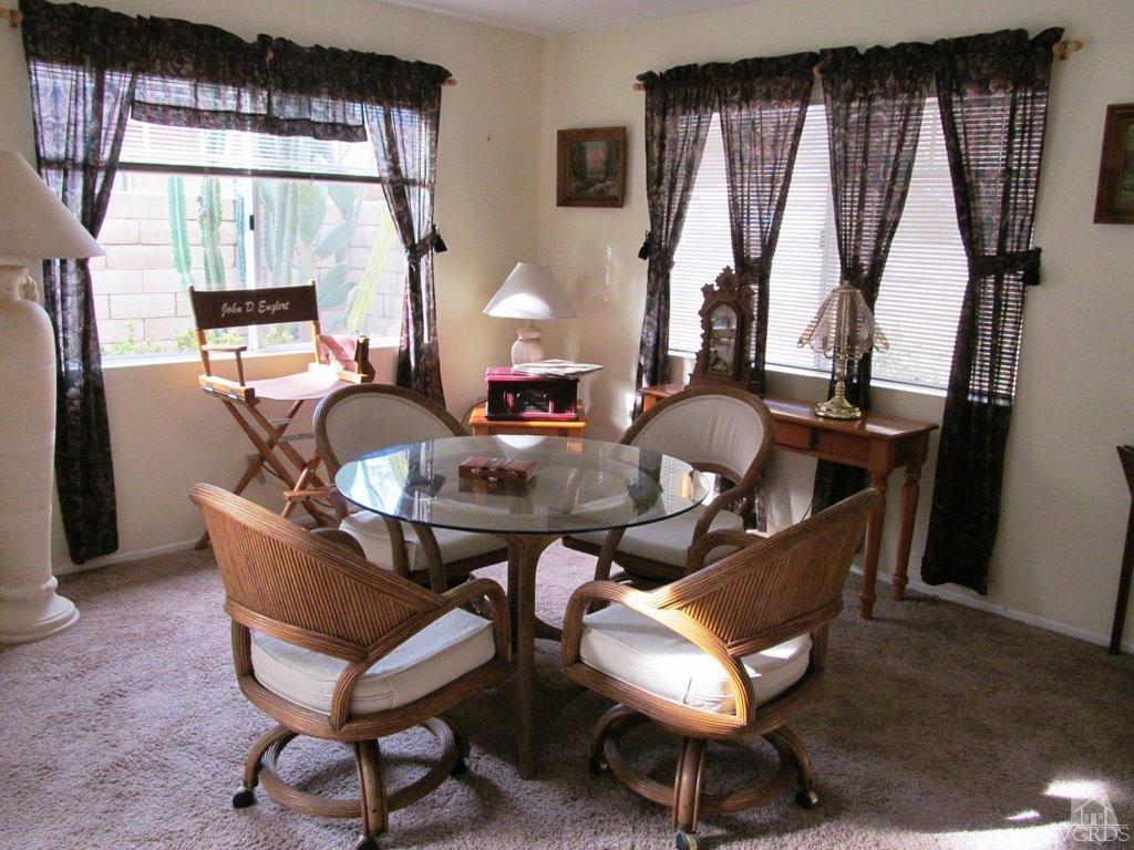 4508 Apricot Road, Unit A Simi Valley, CA 93063 - Photo 3 of 27 a dining room with furniture and window