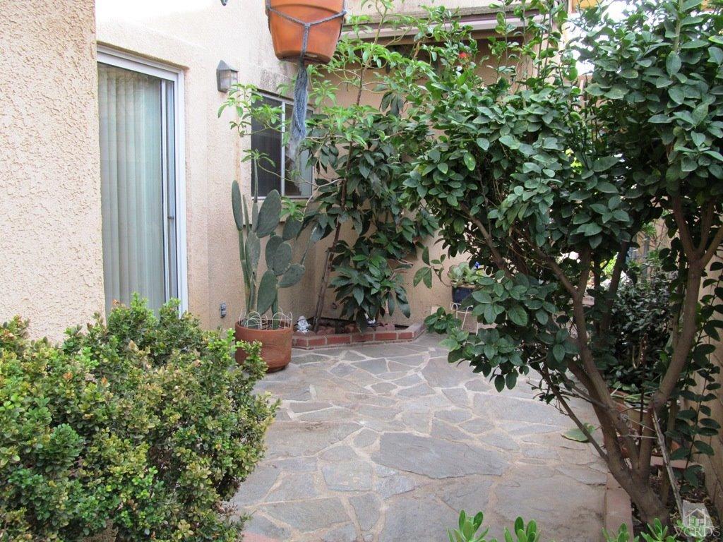 4508 Apricot Road, Unit A Simi Valley, CA 93063 - Photo 22 of 27 a view of a pathway with a tree