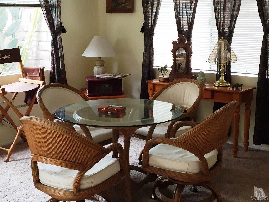 4508 Apricot Road, Unit A Simi Valley, CA 93063 - Photo 4 of 27 a dining room with furniture and wooden floor
