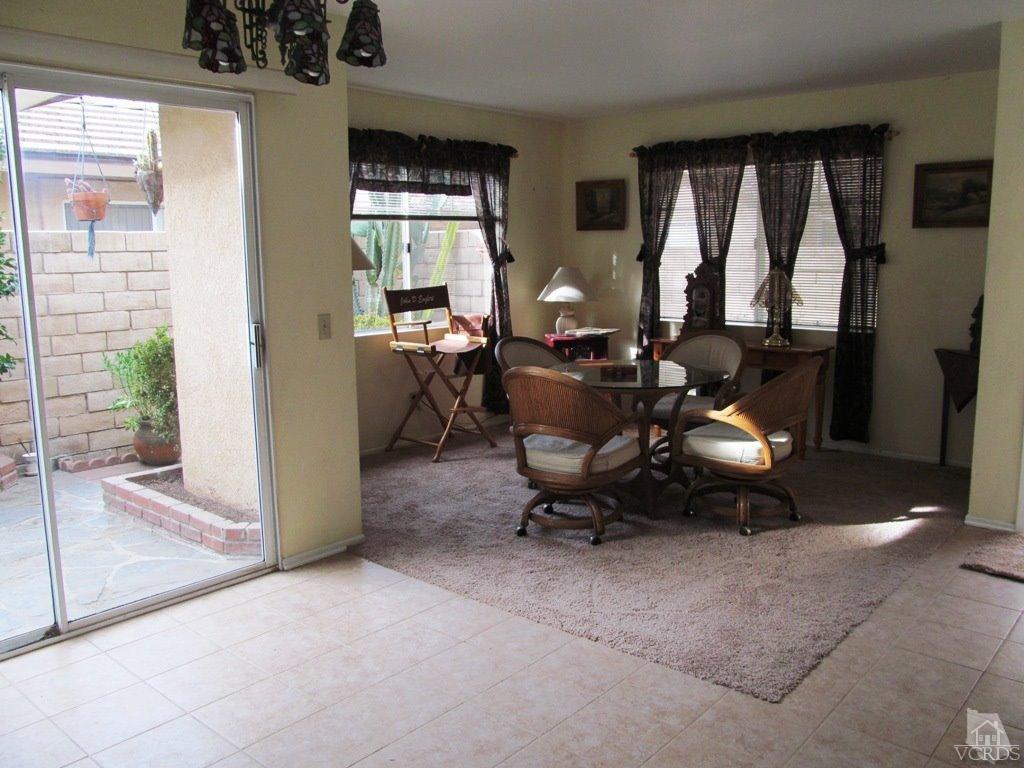 4508 Apricot Road, Unit A Simi Valley, CA 93063 - Photo 5 of 27 a living room with furniture a window and chairs