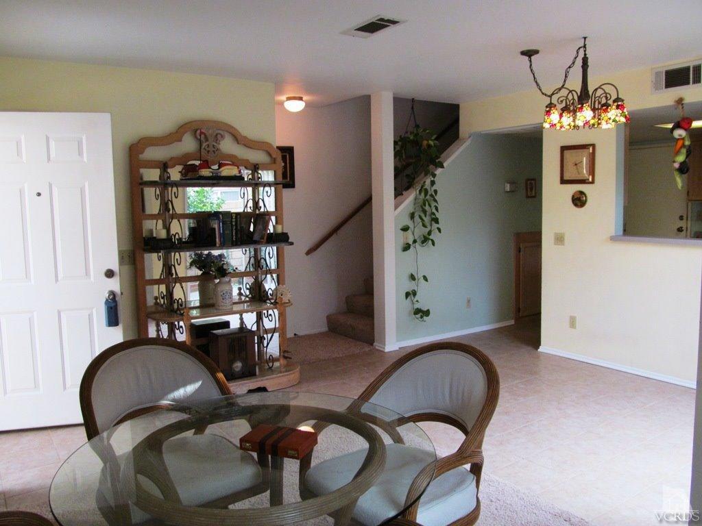 4508 Apricot Road, Unit A Simi Valley, CA 93063 - Photo 10 of 27 a room with furniture and chandelier