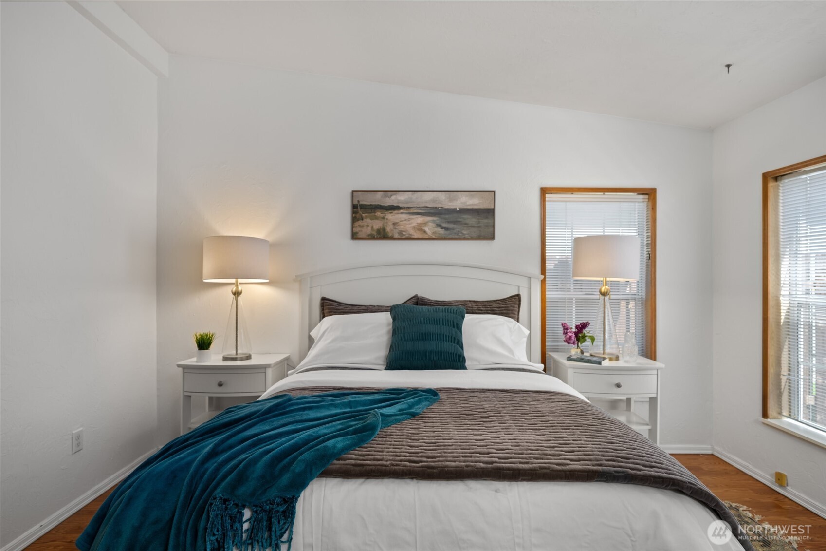 2015 24th Street, Unit 101 Bellingham, WA 98225 - Photo 18 of 24 a bedroom with a large bed and a window