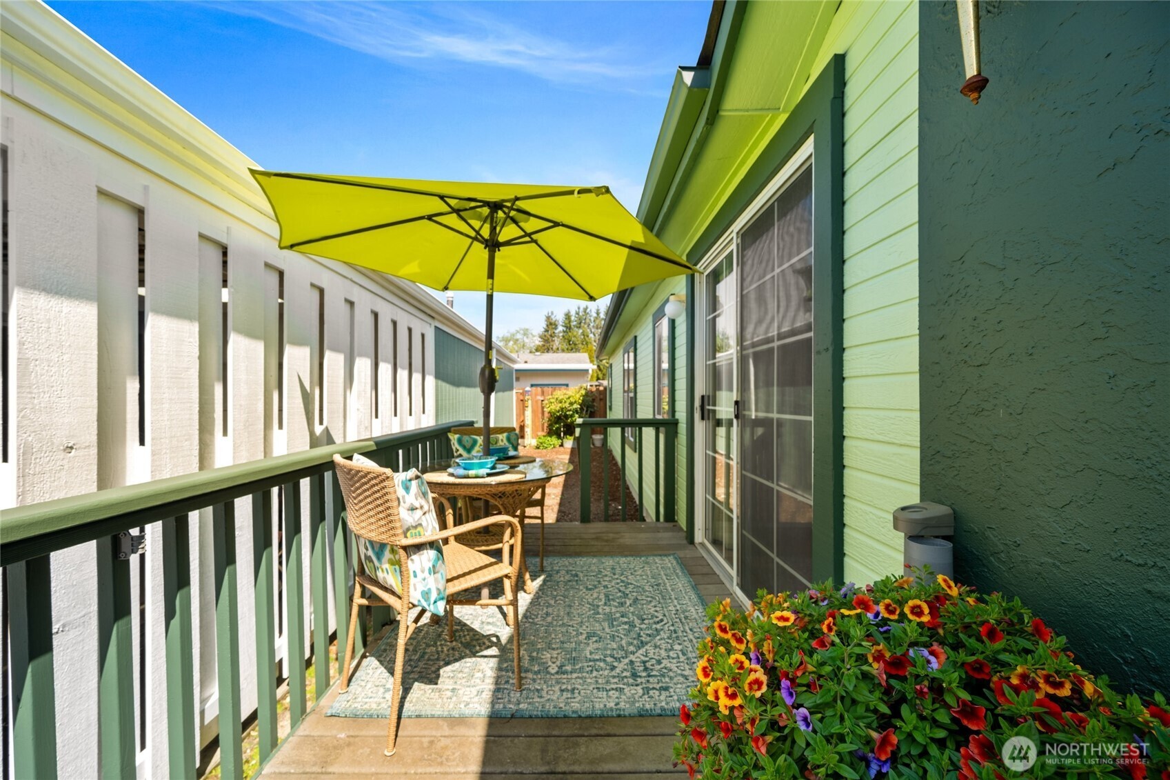 2015 24th Street, Unit 101 Bellingham, WA 98225 - Photo 4 of 24 a view of two chairs and table in the balcony