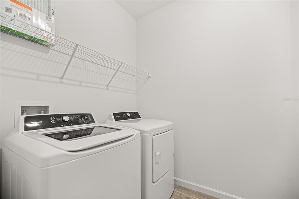 1604 Northwest 44th Court Road Ocala, FL 34482 - Photo 12 of 41 a utility room with dryer and washer