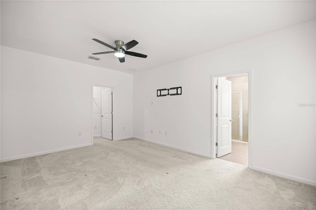 1604 Northwest 44th Court Road Ocala, FL 34482 - Photo 22 of 41 an empty room with closet and windows
