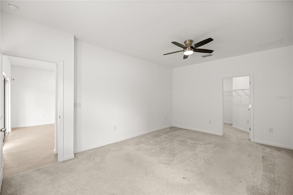 1604 Northwest 44th Court Road Ocala, FL 34482 - Photo 23 of 41 an empty room with a ceiling fan and a window