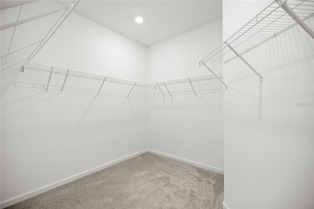 1604 Northwest 44th Court Road Ocala, FL 34482 - Photo 25 of 41 a view of a room with racks on the wall