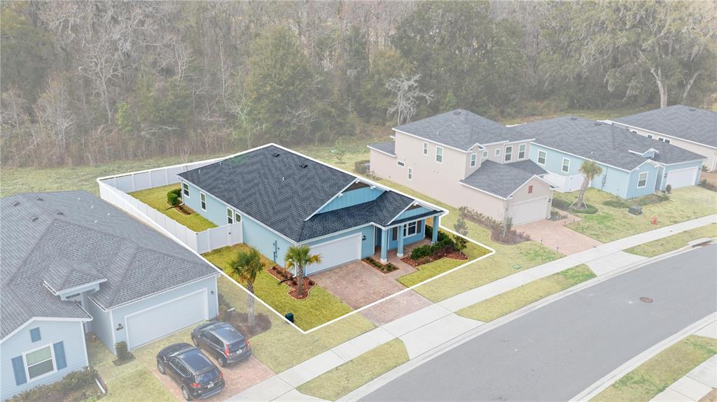 1604 Northwest 44th Court Road Ocala, FL 34482 - Photo 39 of 41 an aerial view of a house with a big yard