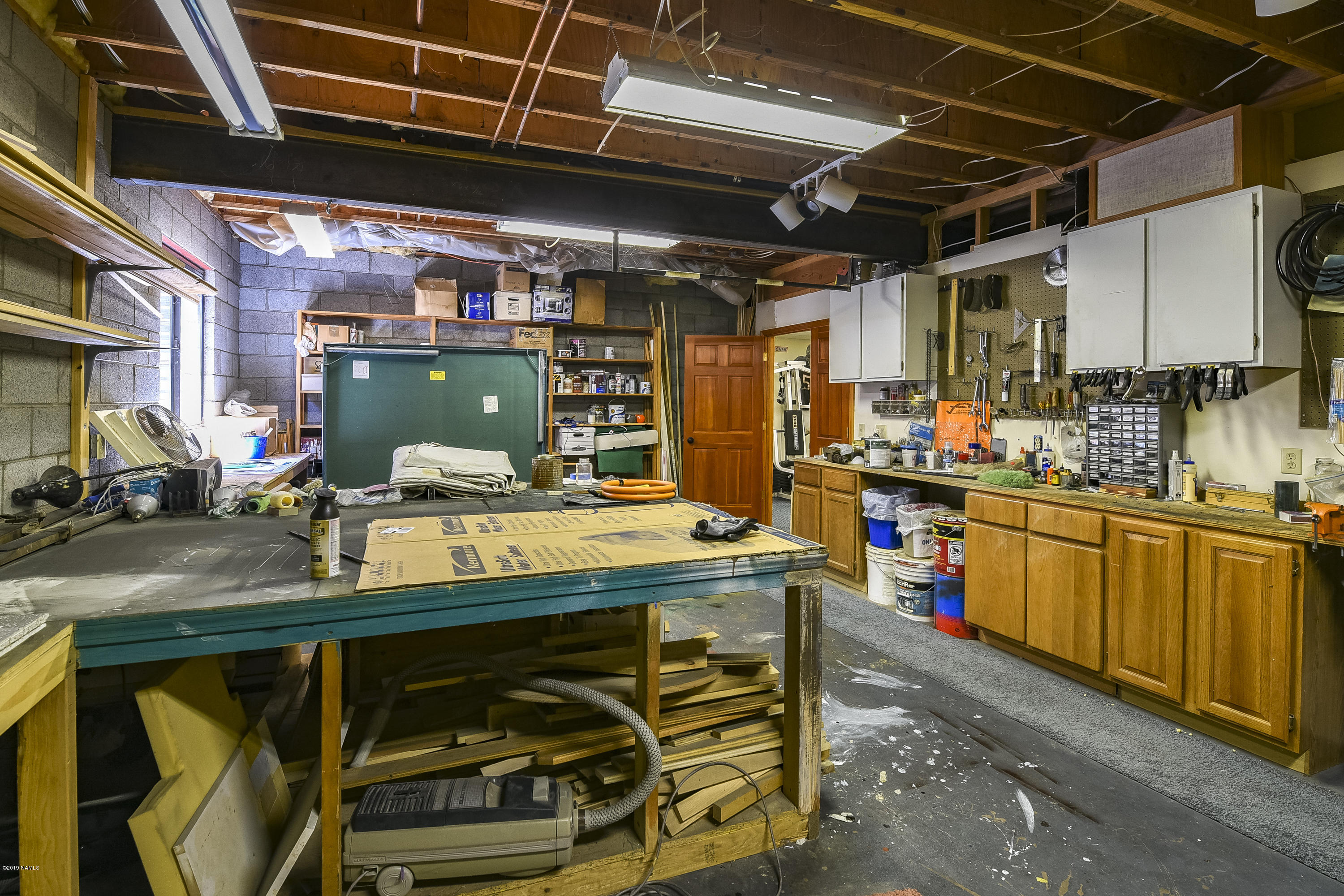 5950 Leupp Road Flagstaff, AZ 86004 - Photo 36 of 67 workshop in basement