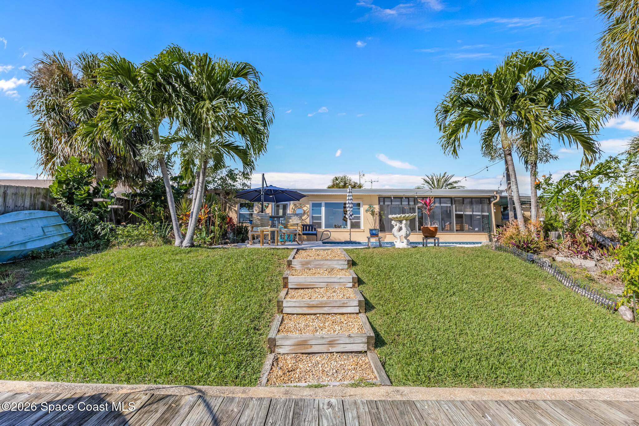 770 New Hampton Way Merritt Island, FL 32953 - Photo 33 of 48 a front view of a house with garden