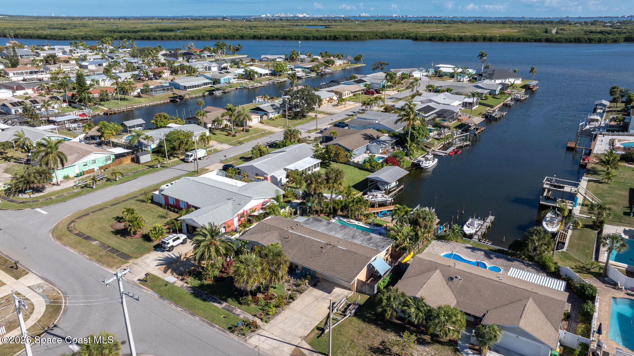 770 New Hampton Way Merritt Island, FL 32953 - Photo 47 of 48 an aerial view of a house with a lake view