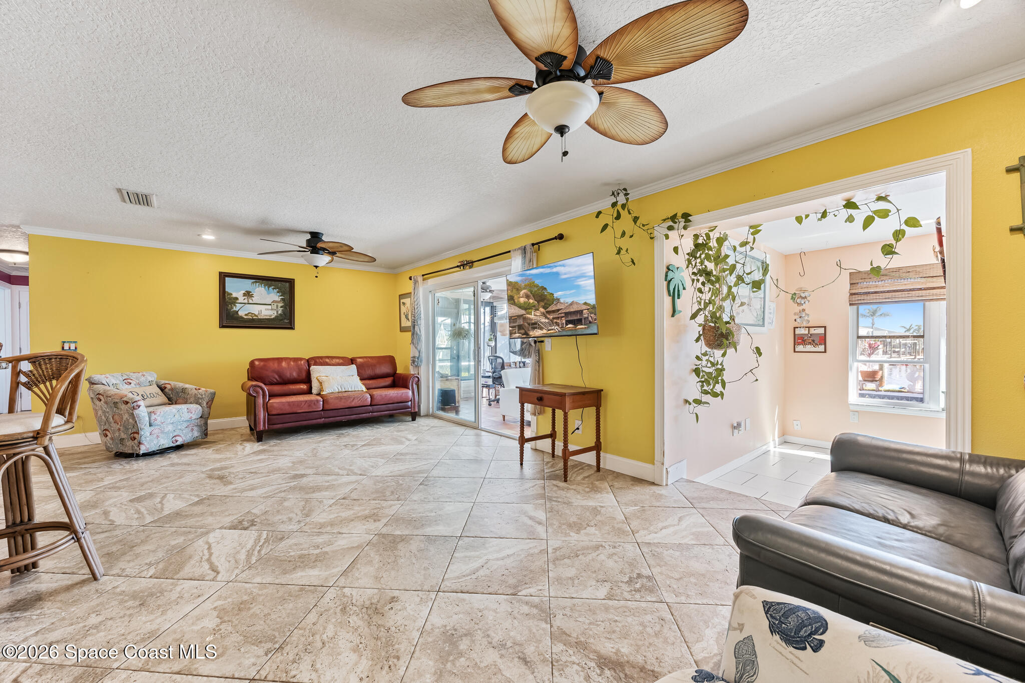 770 New Hampton Way Merritt Island, FL 32953 - Photo 9 of 48 a bedroom with furniture and a chandelier