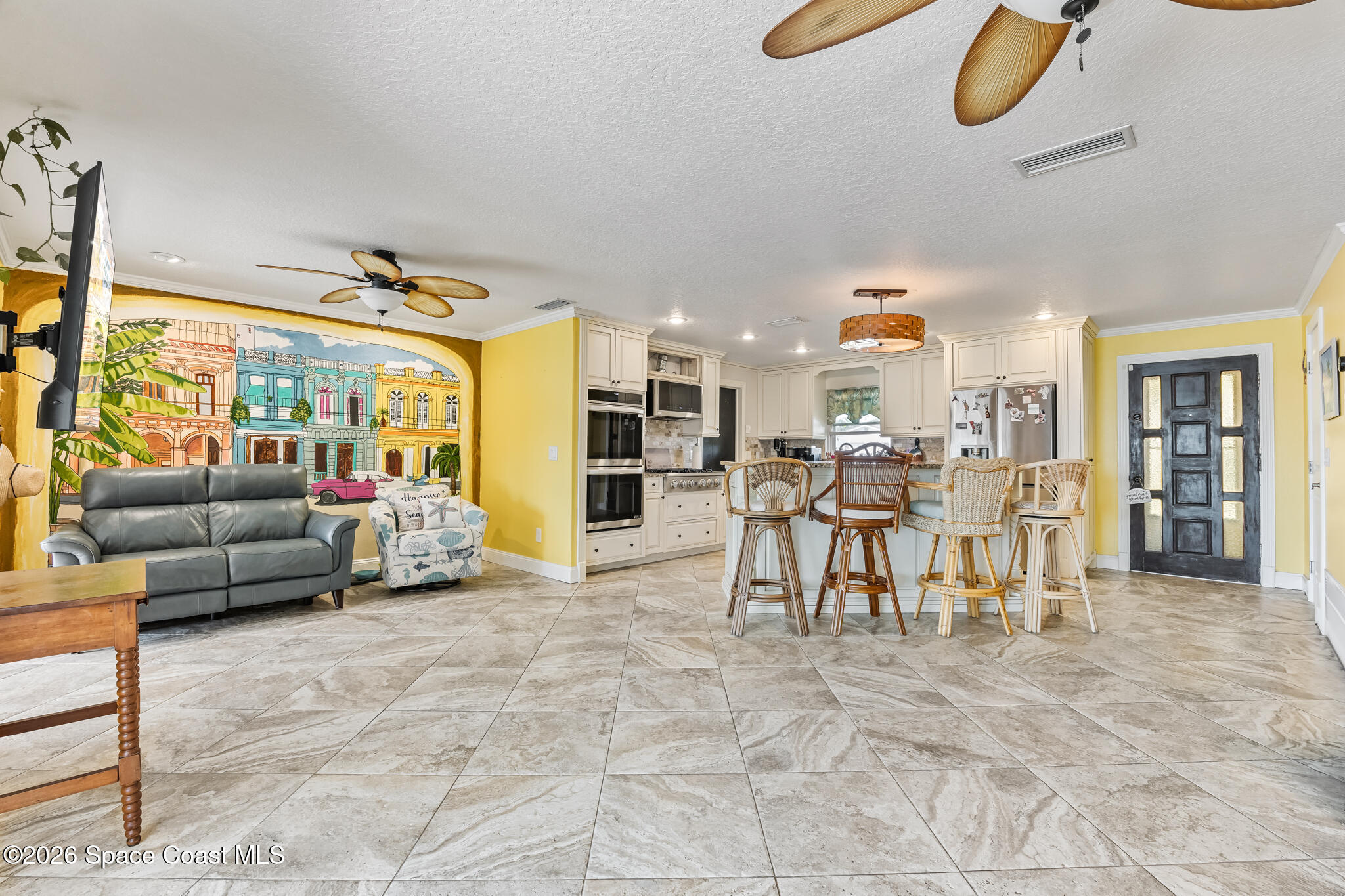 770 New Hampton Way Merritt Island, FL 32953 - Photo 10 of 48 a living room with furniture and a large window