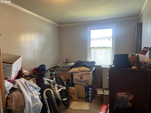 a room with a bed and a window