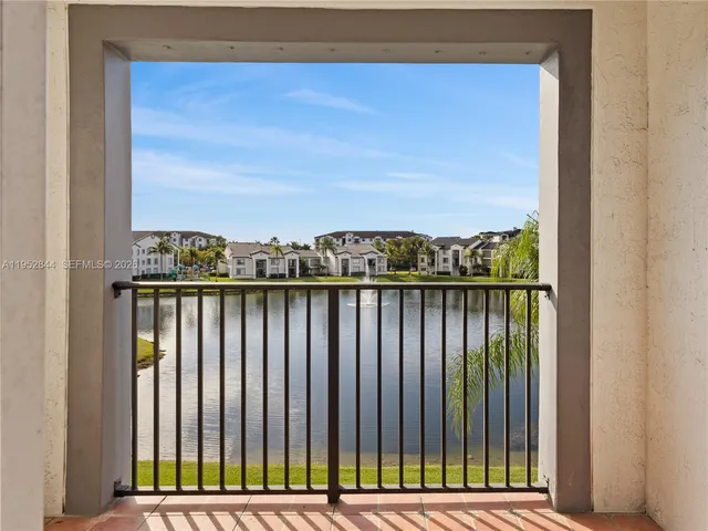 a view of balcony with furniture