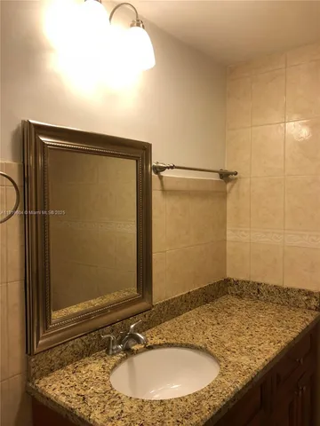 an empty room with a empty space and a window