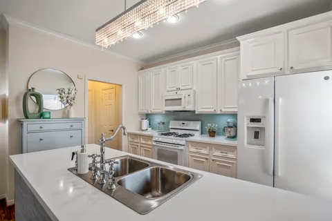 a bathroom with a toilet and a sink