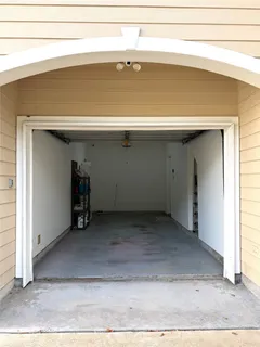 a view of a kitchen with sink and wooden floor