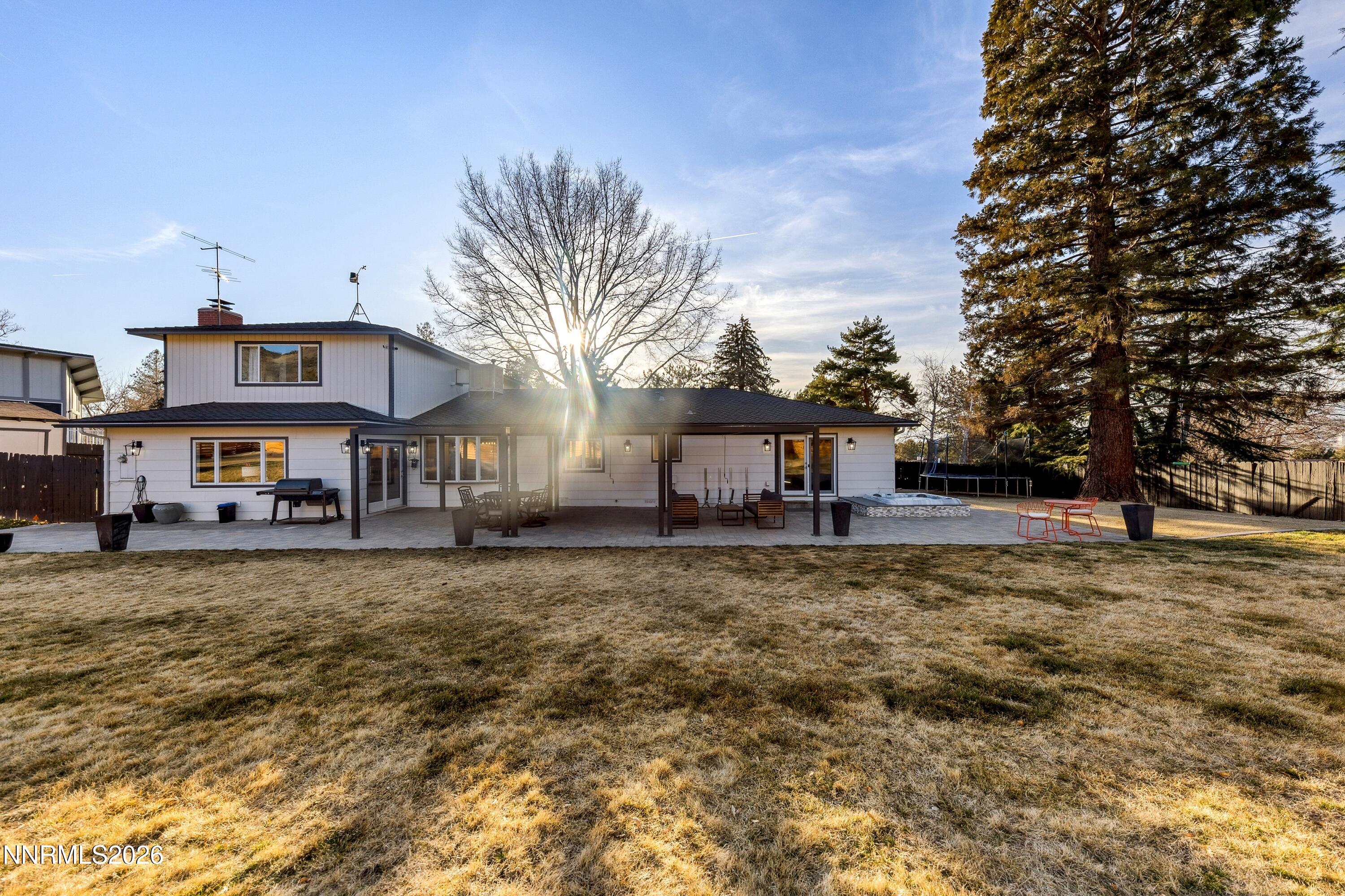 3620 East Hidden Valley Drive Reno, NV 89502 - Photo 56 of 67 a view of a big house with a big yard plants and large trees