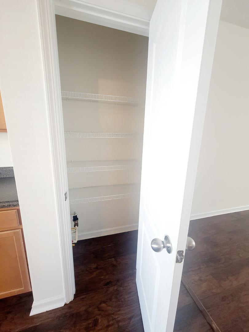 5423 Big Bass Drive Raleigh, NC 27610 - Photo 8 of 42 a view of a room with wooden floor