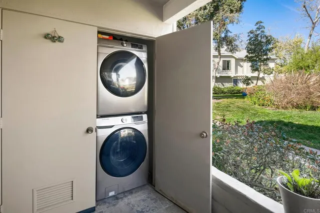 a view of a room with washer and dryer