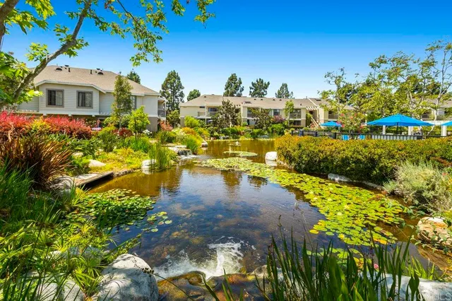 a view of a lake with a house