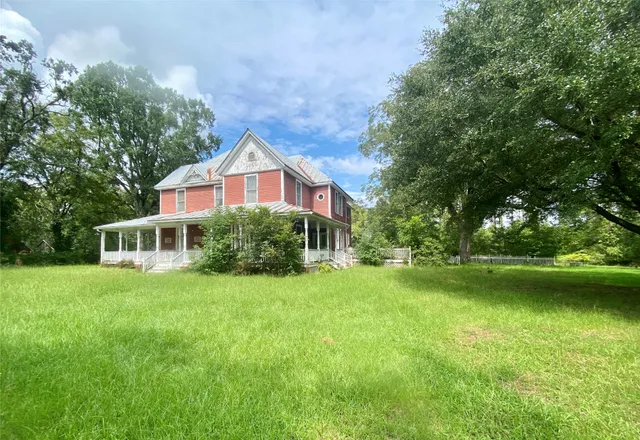 a balcony with furniture and a window